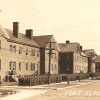 <p><strong>Colonial Revival</strong>: Altered examples of the style. Barracks (Buildings 64-61, left-right), built 1906-1909, shown after removal of wood porches in the late 1930s, view southeast, ca. 1941.</p>